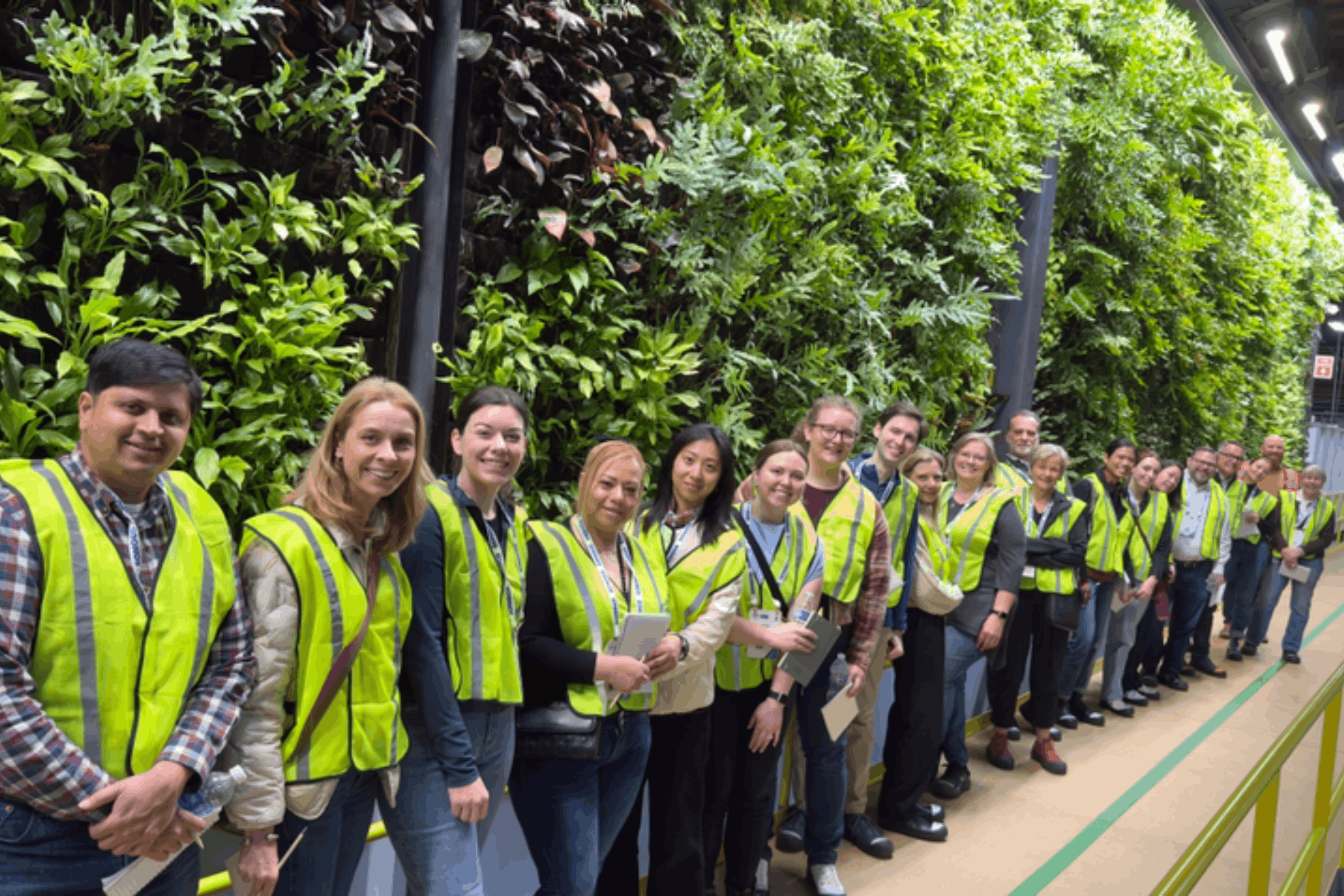 Attendees touring facility